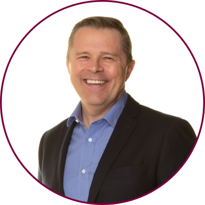Circular headshot of Stu Phillips